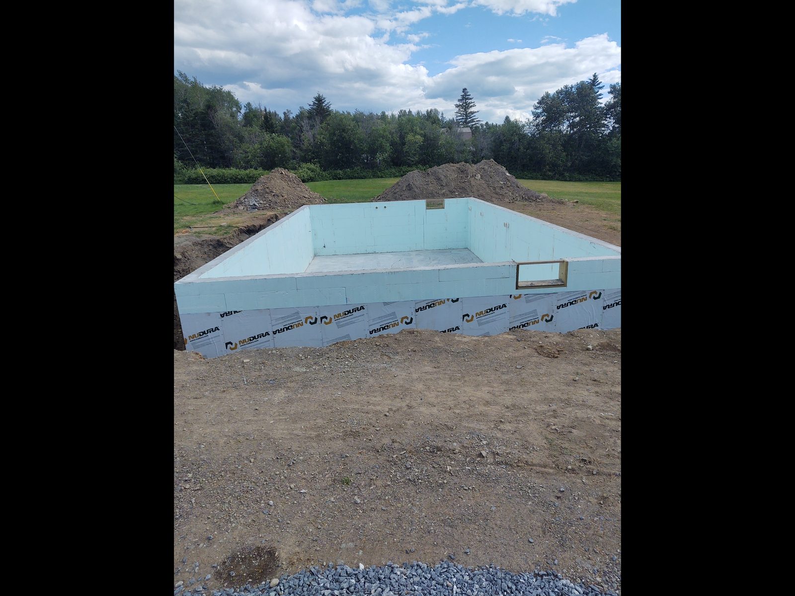 New ICF foundation walls showing perimeter of excavated basement